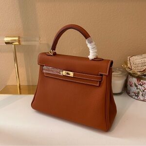 25cm Pumpkin Brown Top Handle KL Belted Leather Satchel